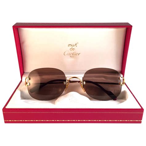 cartier sunglasses 18k gold|gold cartier glasses men's.